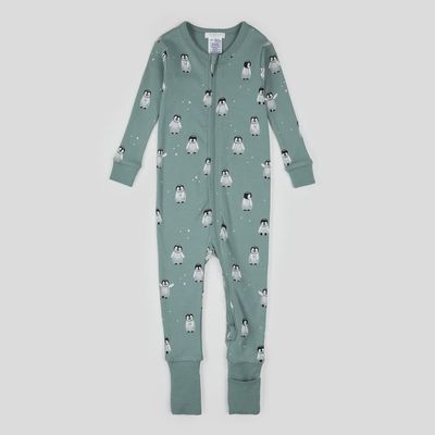 Bébé pingouin imprimé sur lit convertible turquoise