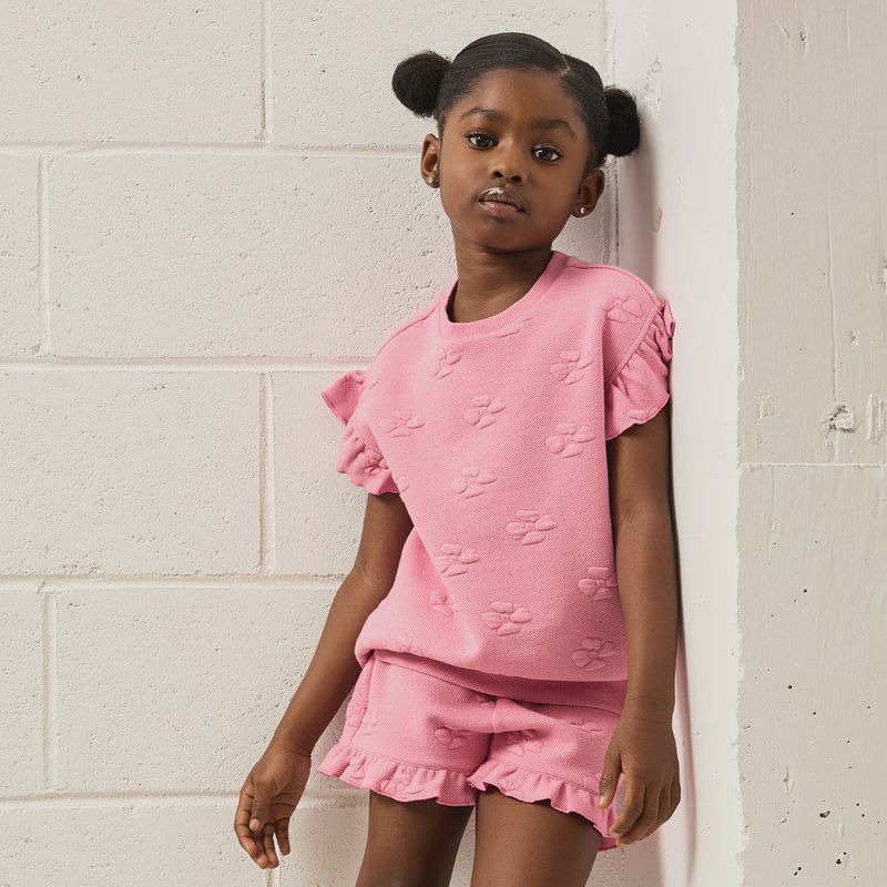 T-shirt à volants magenta à imprimé hibiscus 04K