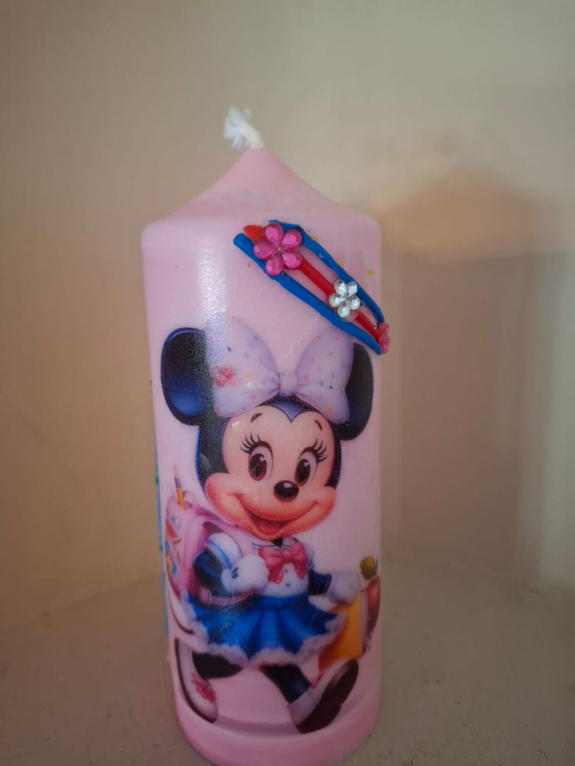Kerze mit Disney‑Design