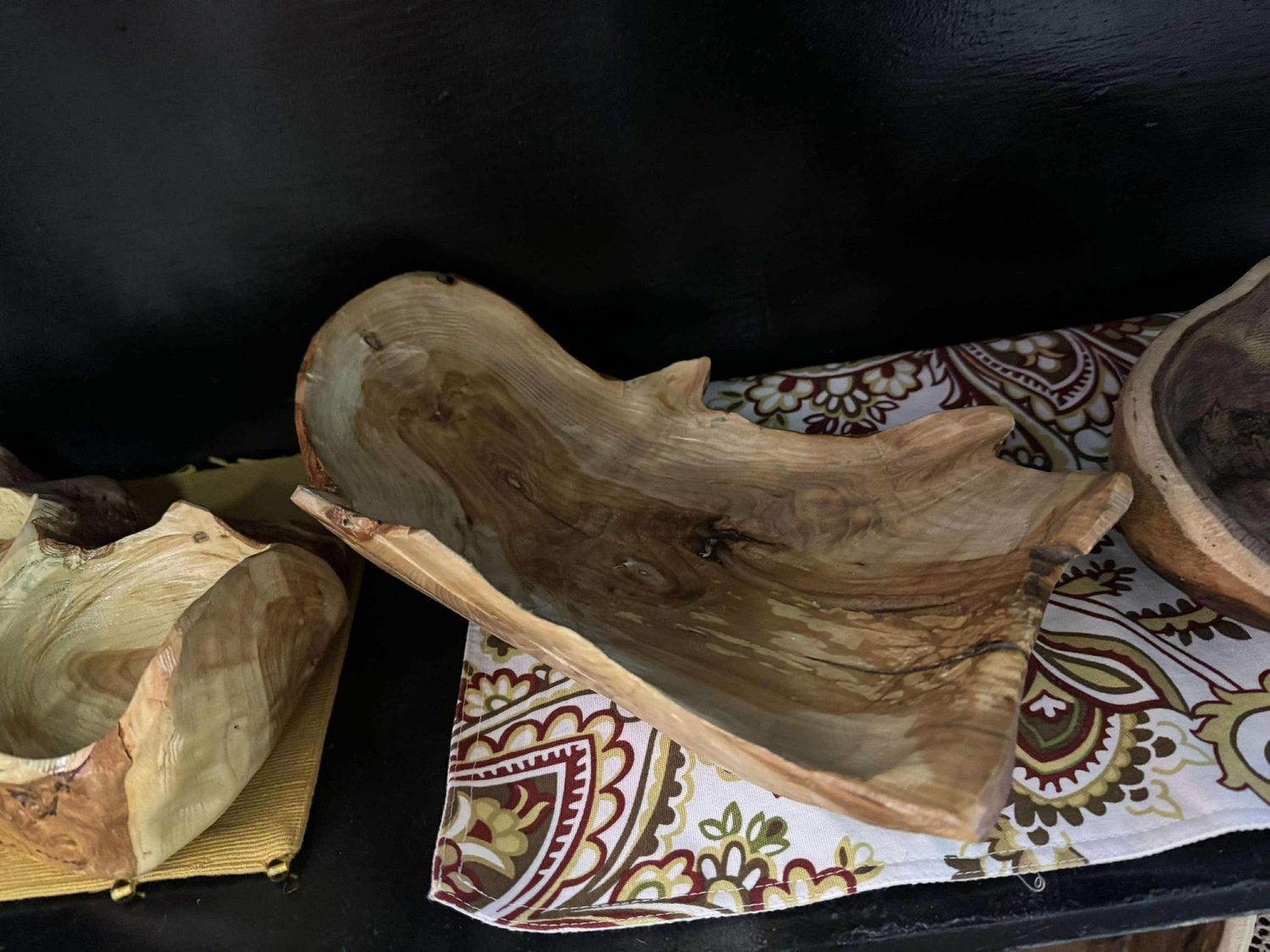 Scoop shaped light wood bowl