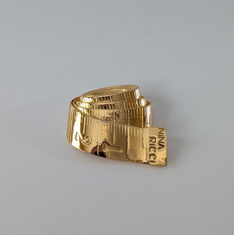 NINA RICCI Gold Measuring Tape Brooch