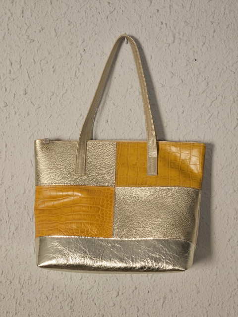 Bolso de piel dorado y mostaza