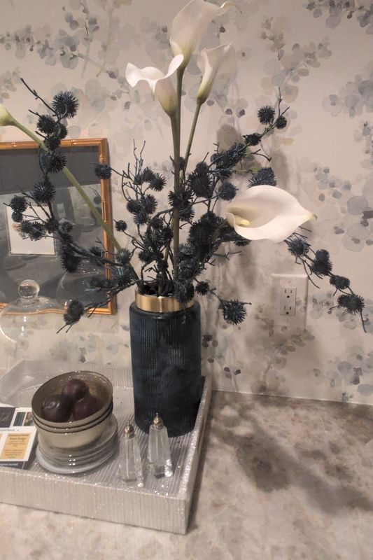 Bluegrass vase thistle and callas