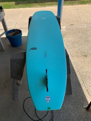 USED 9'4 NSP SLEEPWALKER INCLUDES BAG,LEASH AND FINS