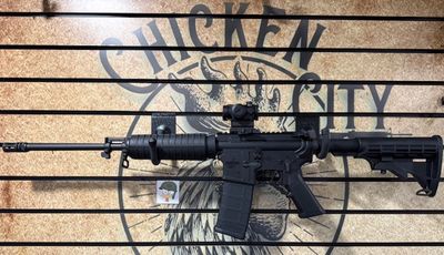 Bushmaster XM-15-E2S 5.56 NATO with Red Dot Sight *Pre -Owned &amp; UNFIRED*
