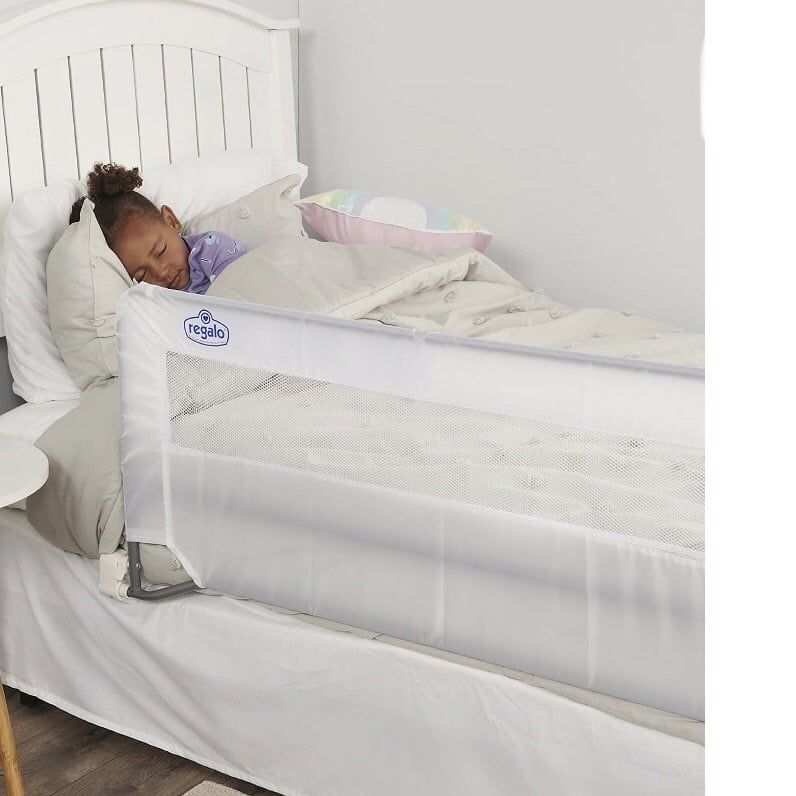 Swing down bed rail
