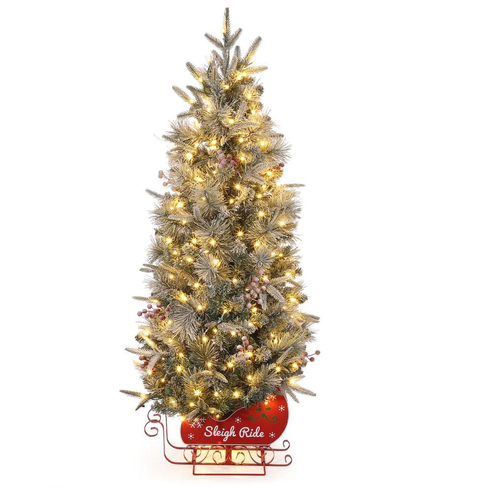 4.5 ft pre lit flocked Christmas tree in sleigh