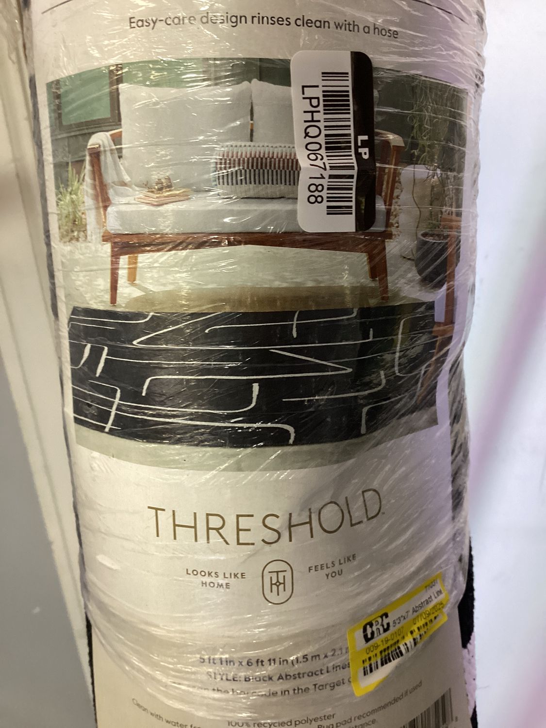 5'3"x7' Abstract Lines Outdoor Area Rug Black - Threshold