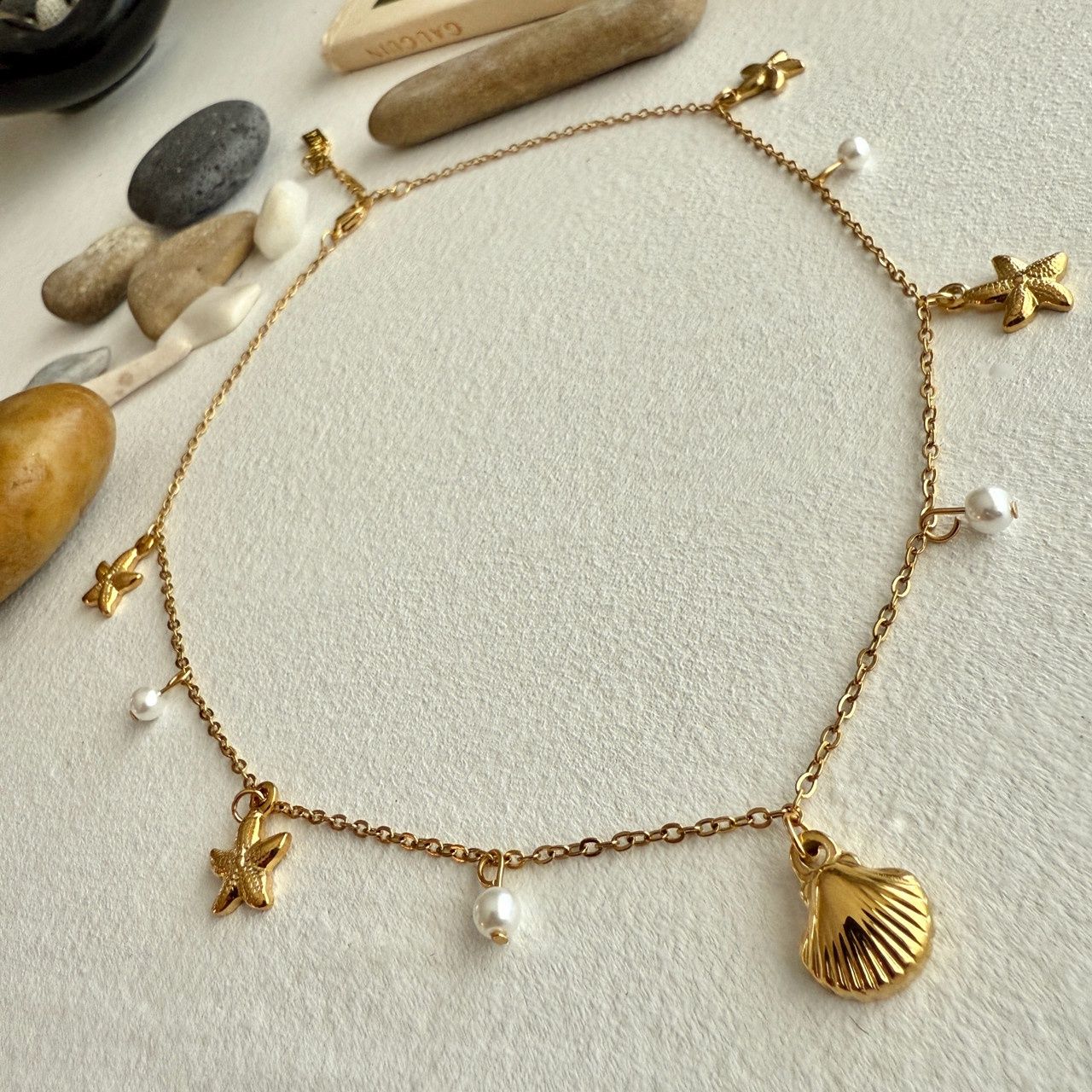 "Sechelt" Sea Necklace With Shell And Starfish Charms In Gold