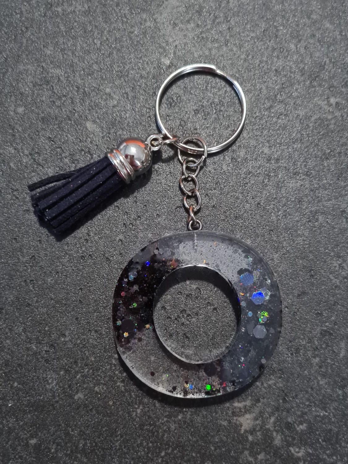 O - Black Glitter