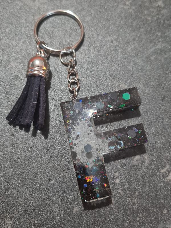 F - Black Glitter