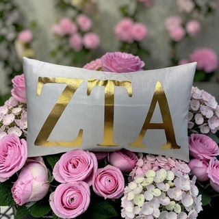 Zeta Tau Alpha gold foil pillow