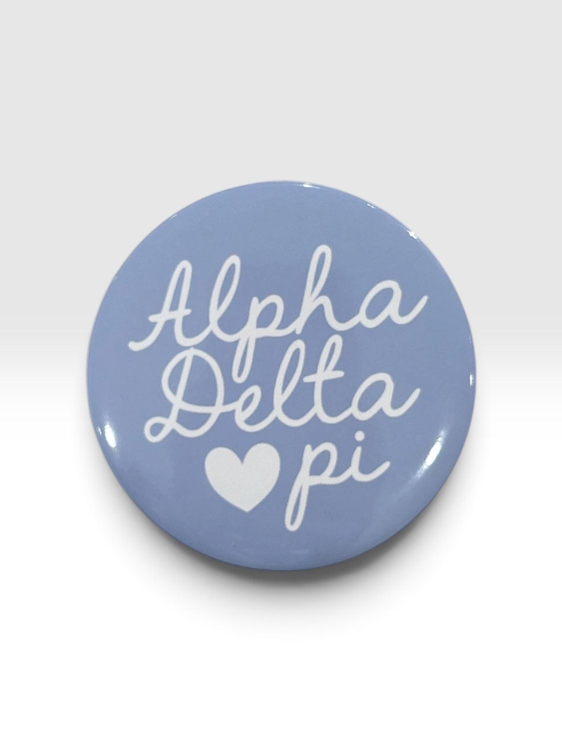 Alpha Delta Pi cursive button