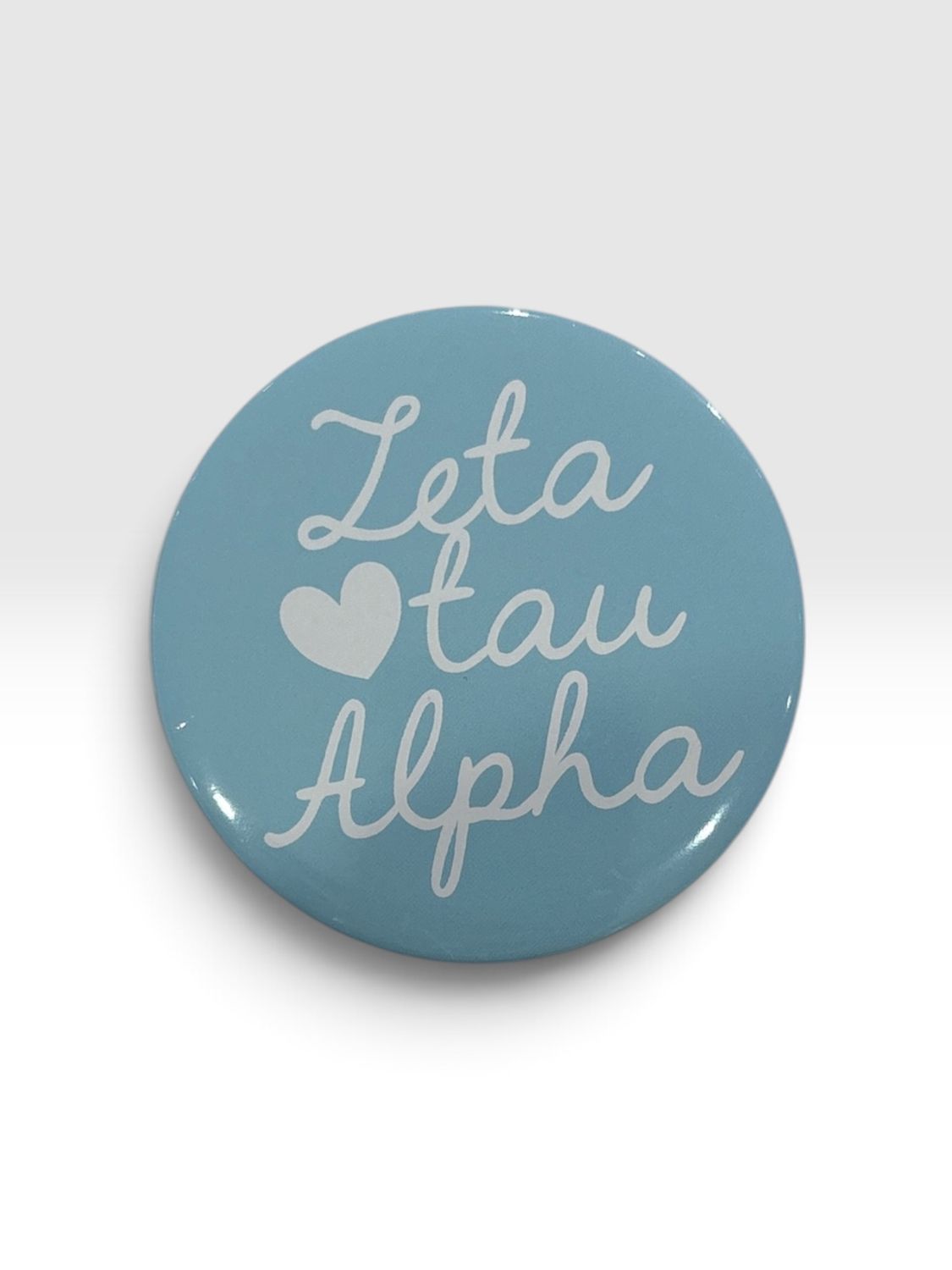 Zeta Tau Alpha cursive button