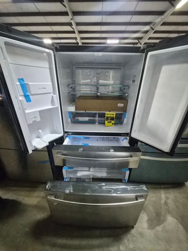 Scratch &amp; Dent GE Profile 28.7 Cu. Ft. 4-Door French-Door Refrigerator PGE29BYTFS