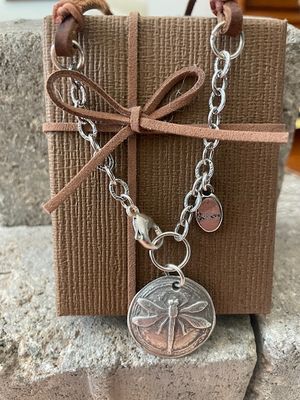 Large Dragonfly on Leather