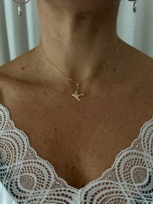 Gold swallow necklace