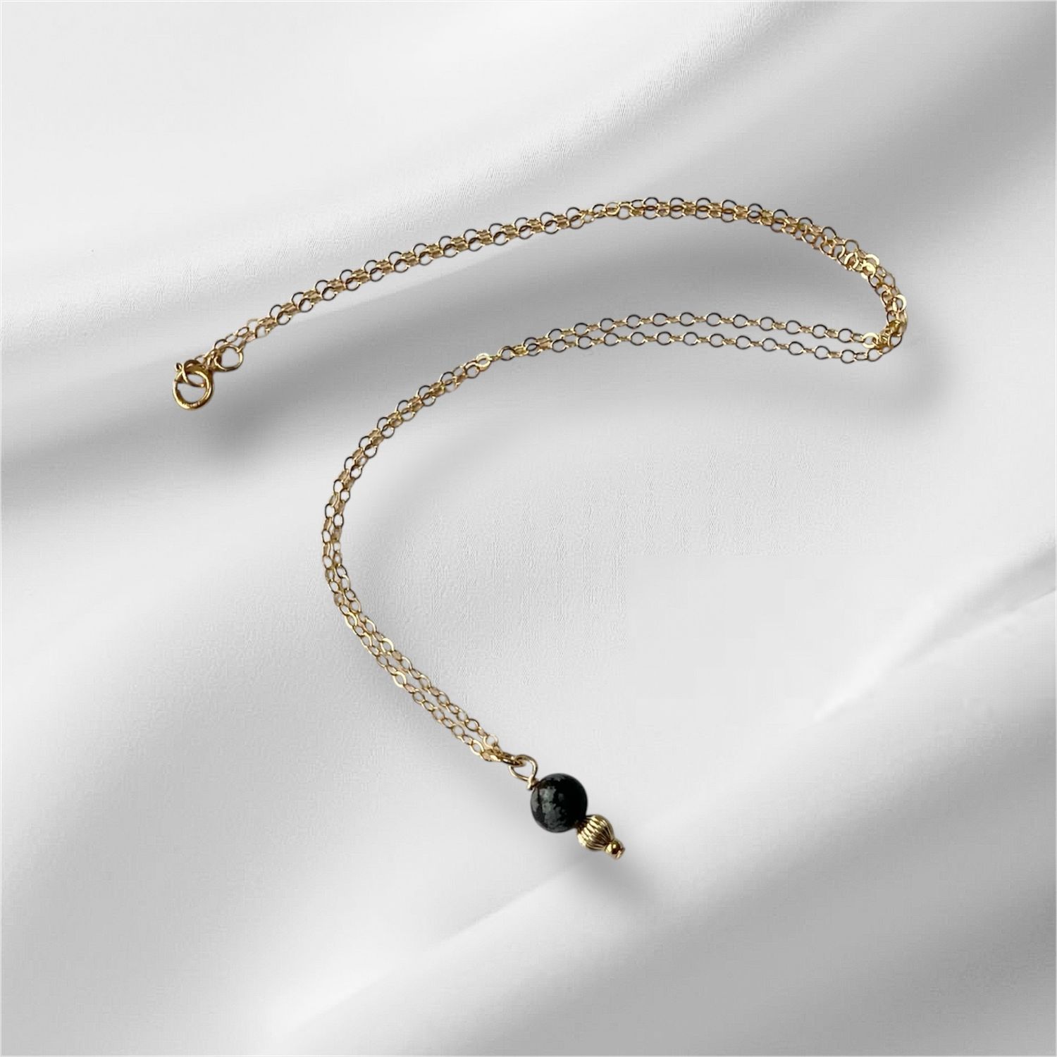 Gold gemstone necklace