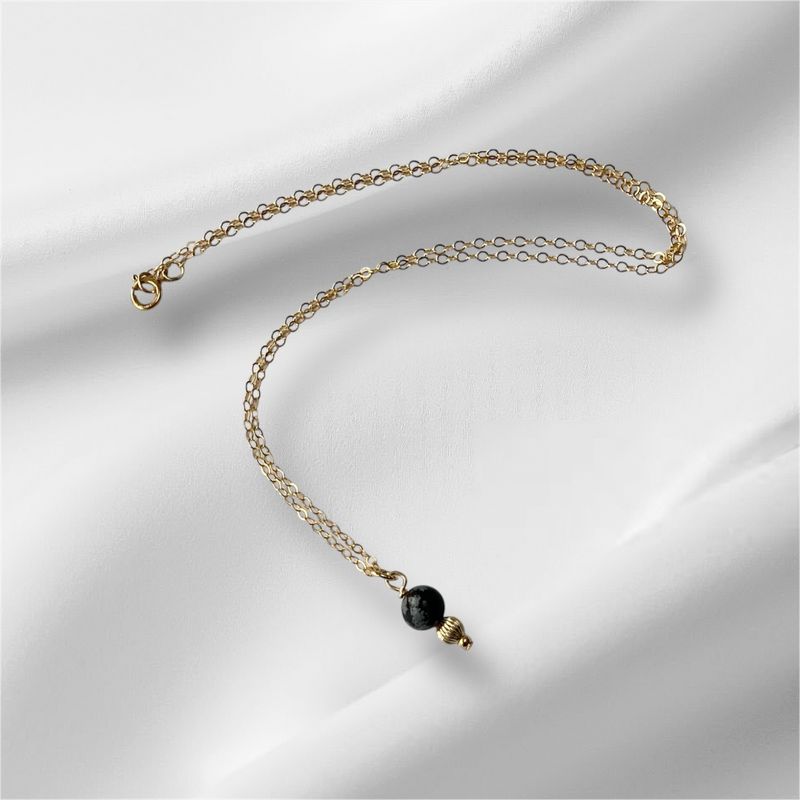Gold gemstone necklace