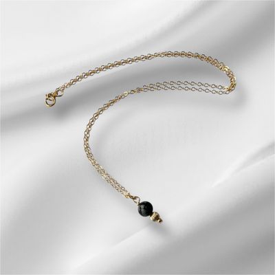 Gold gemstone necklace