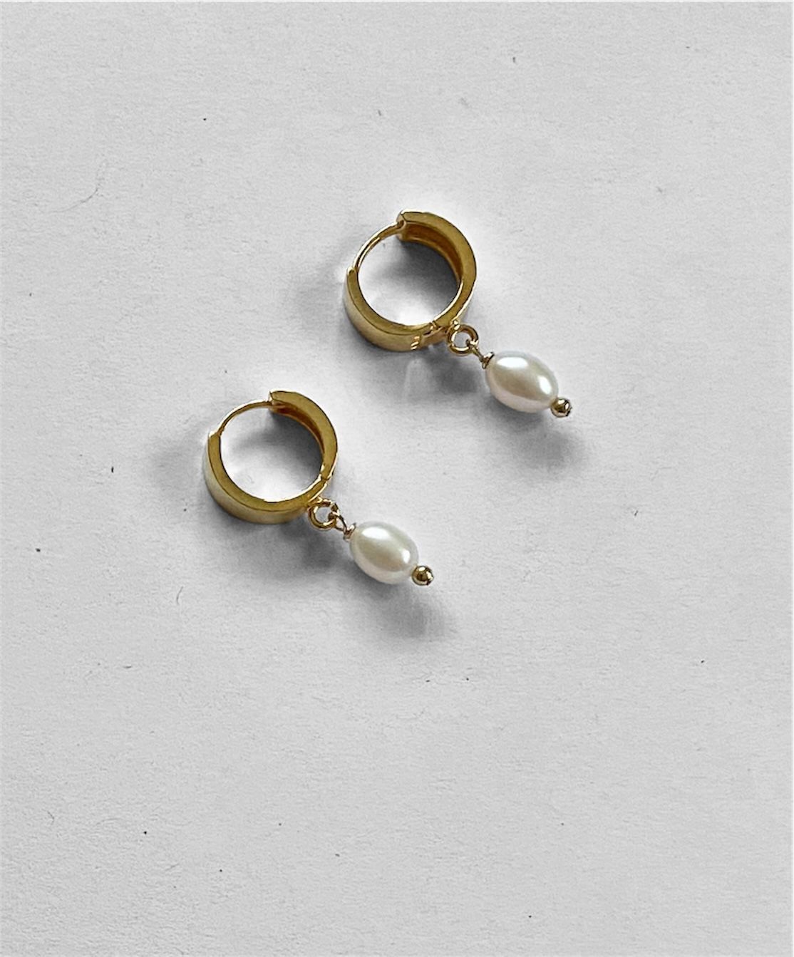 Gold wide huggie pearl hoop earrings