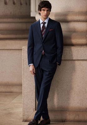 Tailored Navy Pinstripe Suit – Modern Elegance in Motion