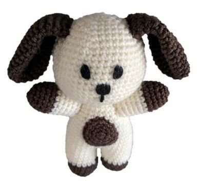 A cream and dark brown crocheted dog toy.