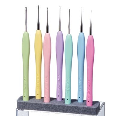 A photo of the 7 crochet hooks with pastel handles.