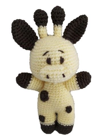 A yellow and brown crocheted giraffe toy.