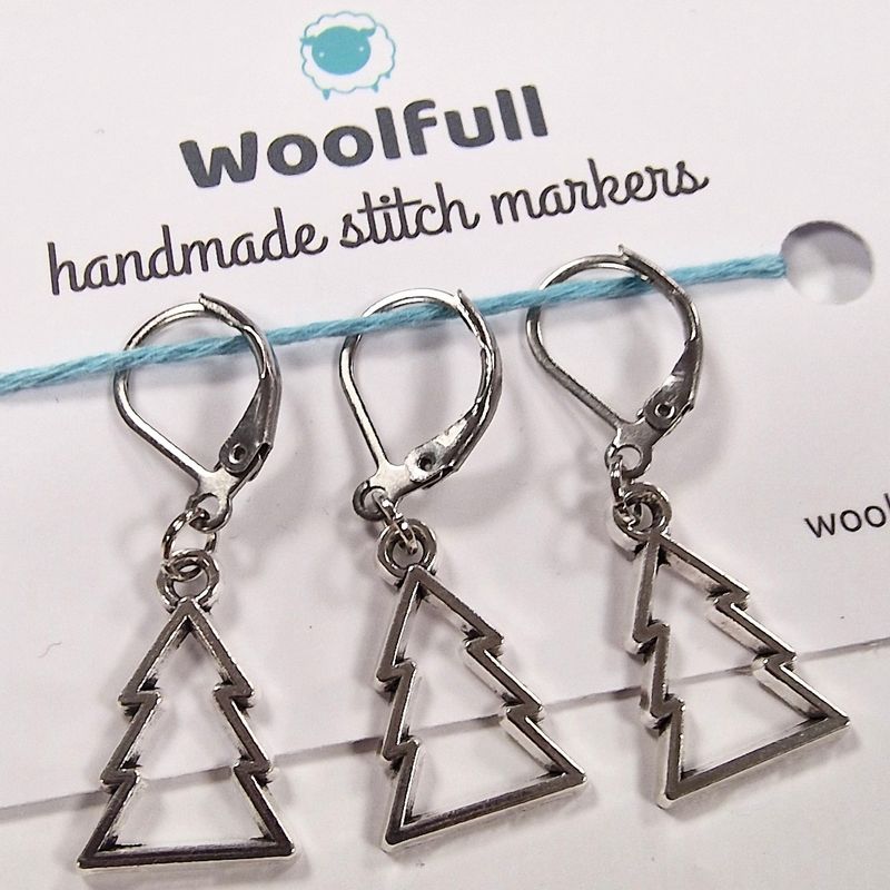 3 silver metal Christmas tree shaped stitch markers.