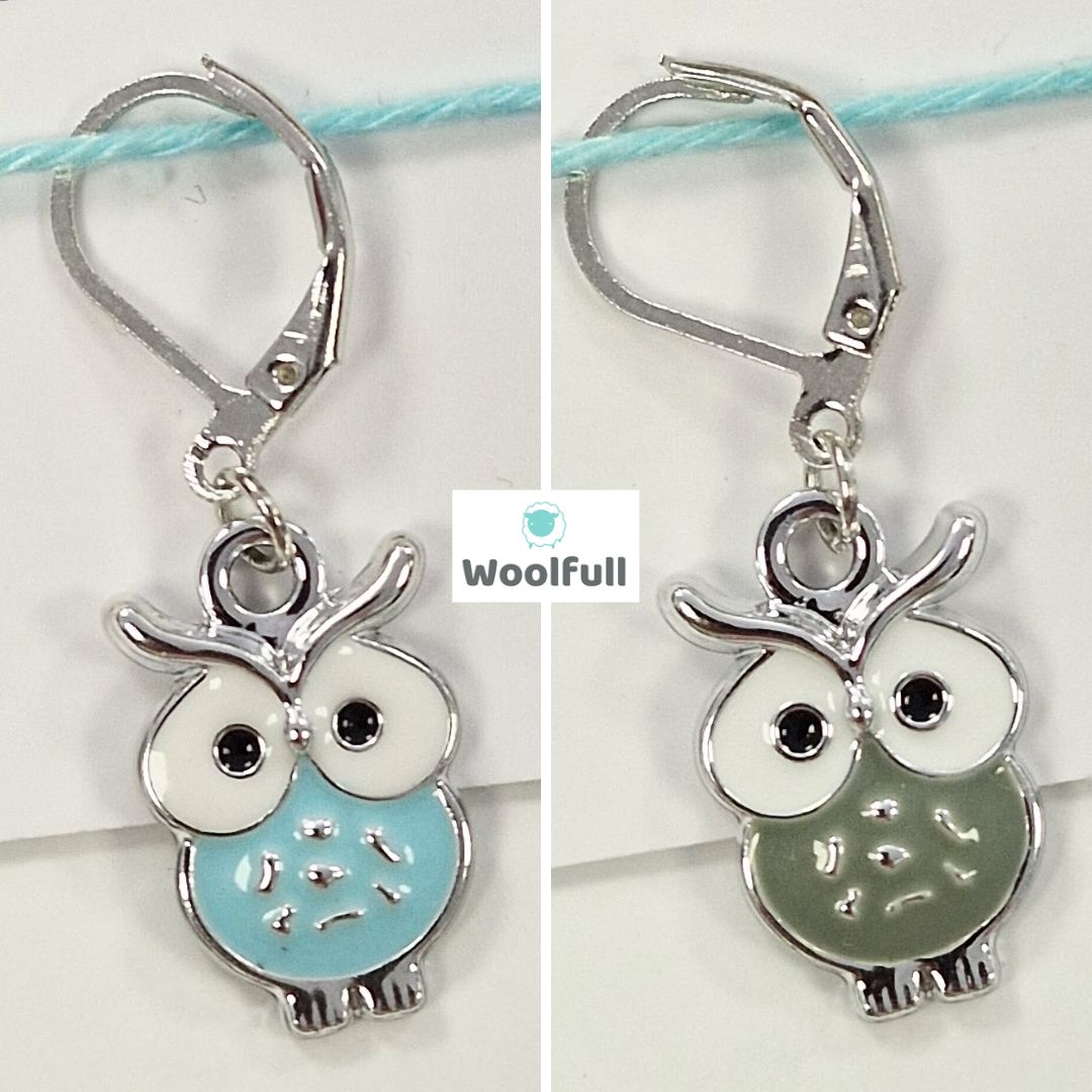 2 owls shaped stitch markers, 1 blue and 1 sage.