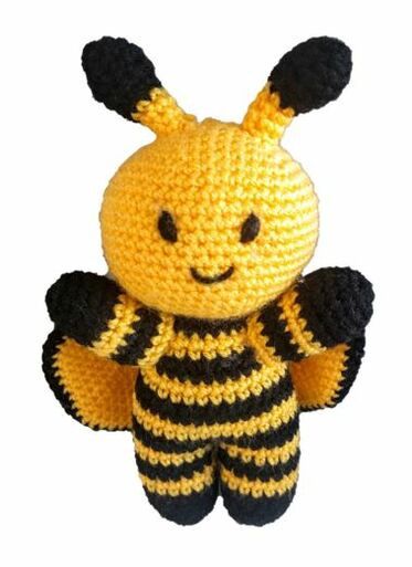 A yellow and black crocheted bee toy.