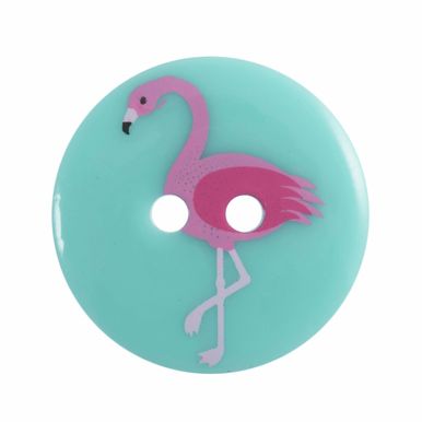  A round blue button with a pink flamingo design on it.