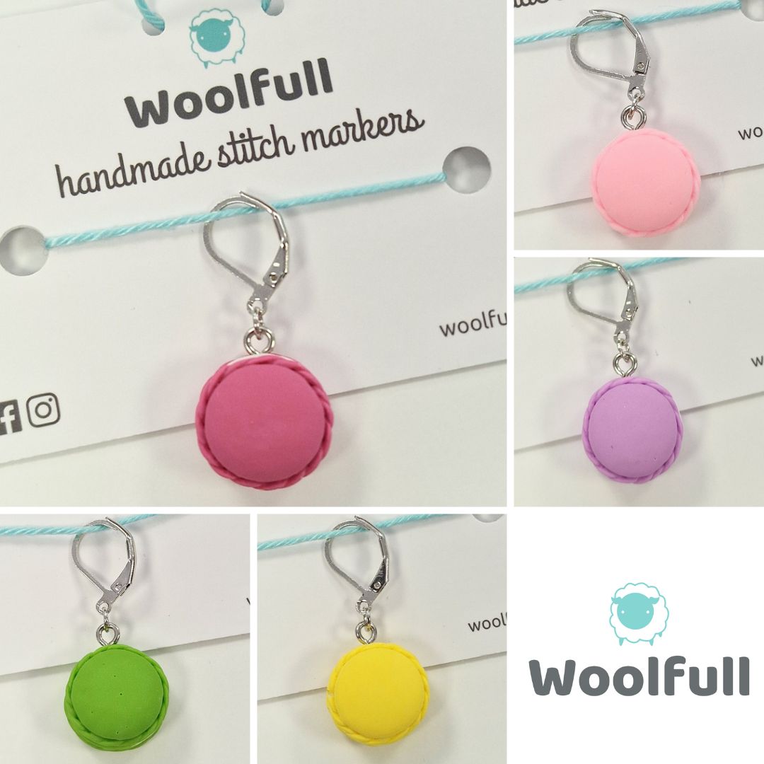 5 macaron shaped stitch markers in light pink, dark pink, yellow, green and purple.