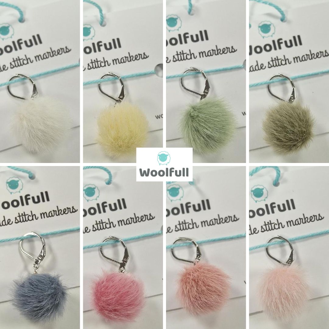 A shade card showing the 8 available shades of pompom stitch markers.