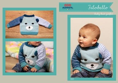A baby is wearing a knitted sweater in various shades of blue, with a bear face on the front.