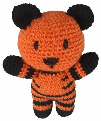 An orange and black crocheted tiger toy.
