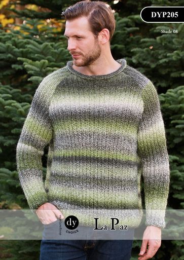 A man is wearing a knitted sweater in a variegated green and grey yarn.