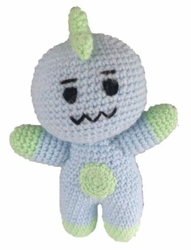 A blue and green crocheted dinosaur toy.