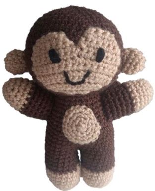 A brown crocheted monkey toy.