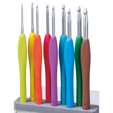 A photo of the 9 crochet hooks with brightly coloured handles.