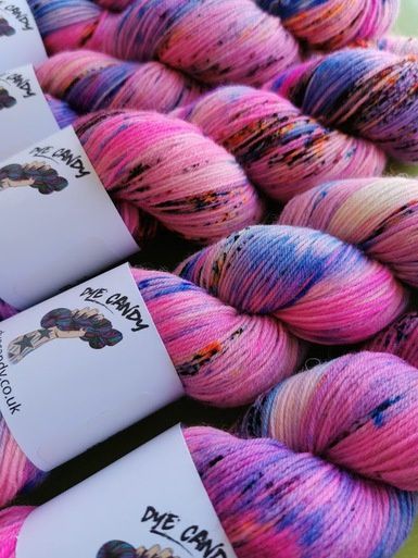 A close up of the skeins, in variegated pink and blue.