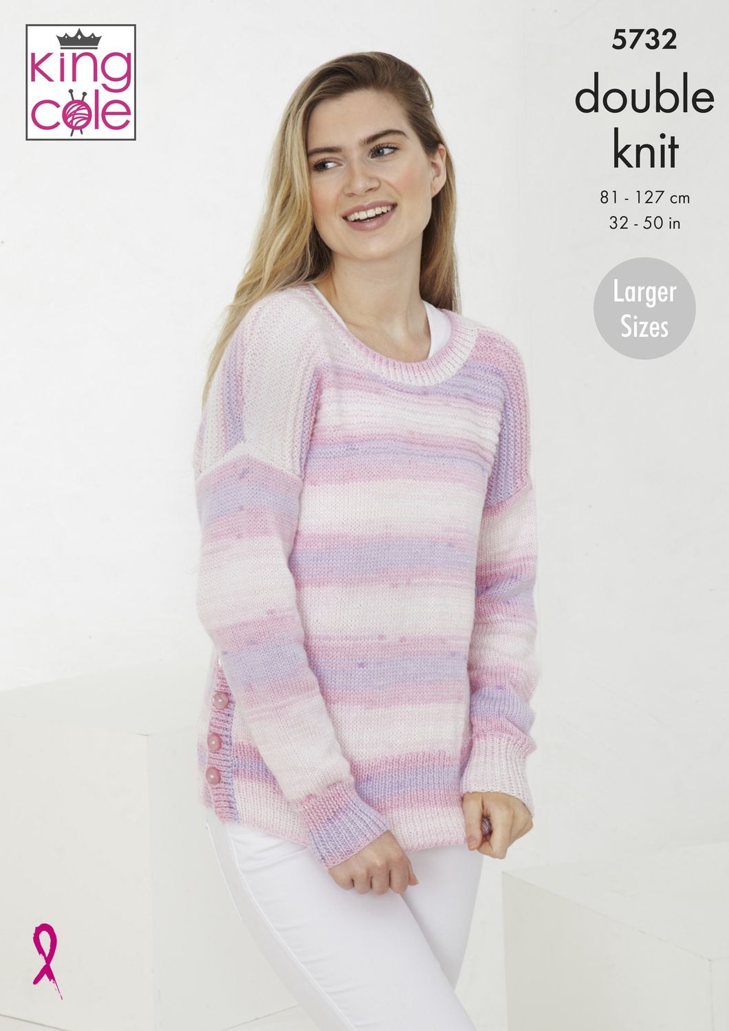 A woman is wearing a knitted sweater in a variegated pink, purple and cream yarn.