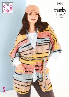 A woman is wearing a variegated knitted cardigan in shades of yellow, red, brown and blue with random thin black stripes throughout.