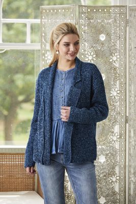 A woman is wearing a dark blue knitted cardigan.