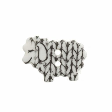 A white sheep shaped button with a knitted effect.