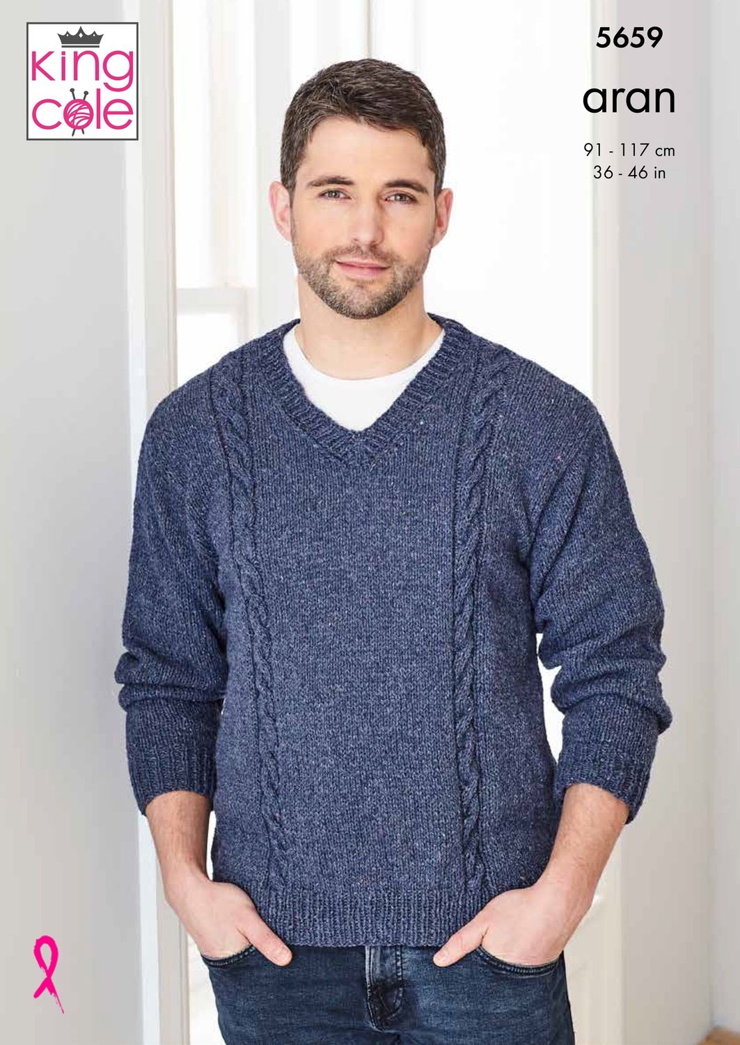 A man is wearing a dark blue knitted sweater.