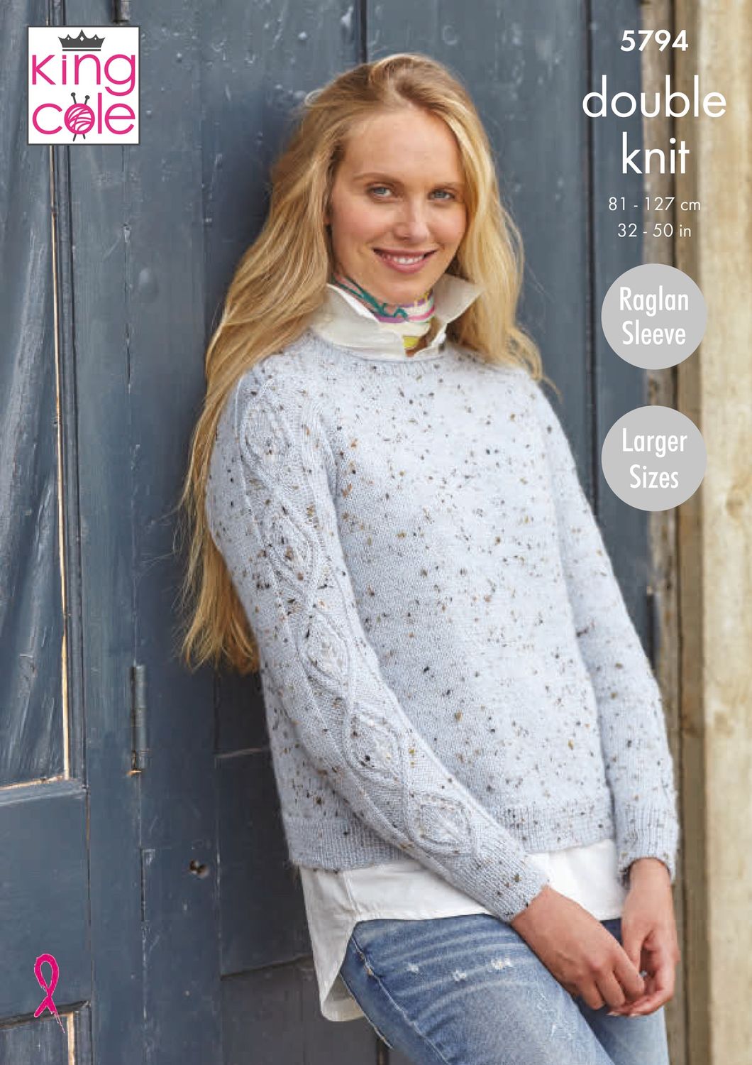 A woman is wearing a pale blue knitted sweater with cable down the sleeves.