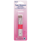 A white fabric tape measure in pink packaging.
