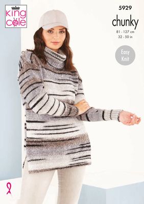 A woman is wearing a variegated knitted sweater in shades of cream, brown and grey with random thin black stripes throughout.